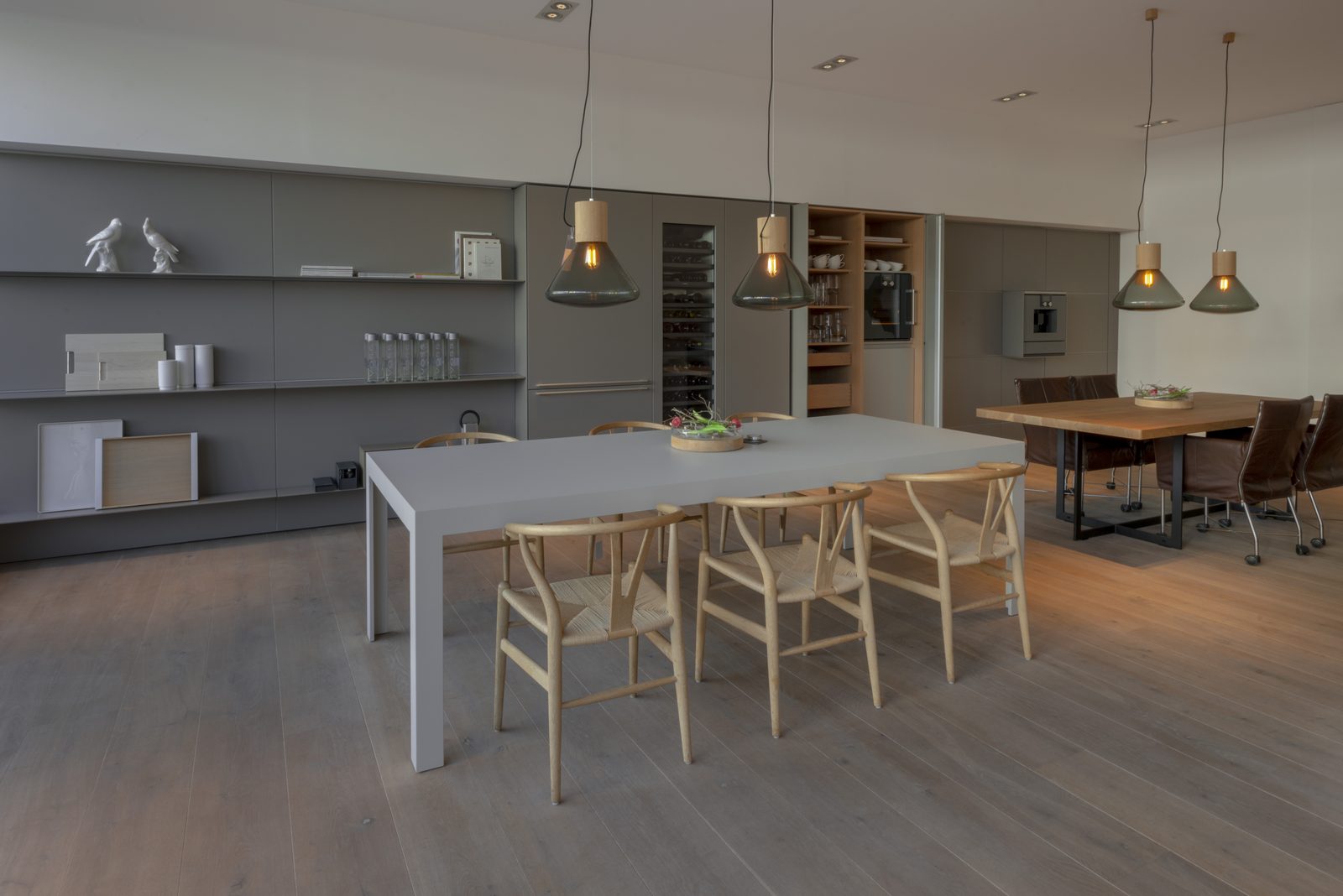 Dining table with Wishbone chairs and shelving