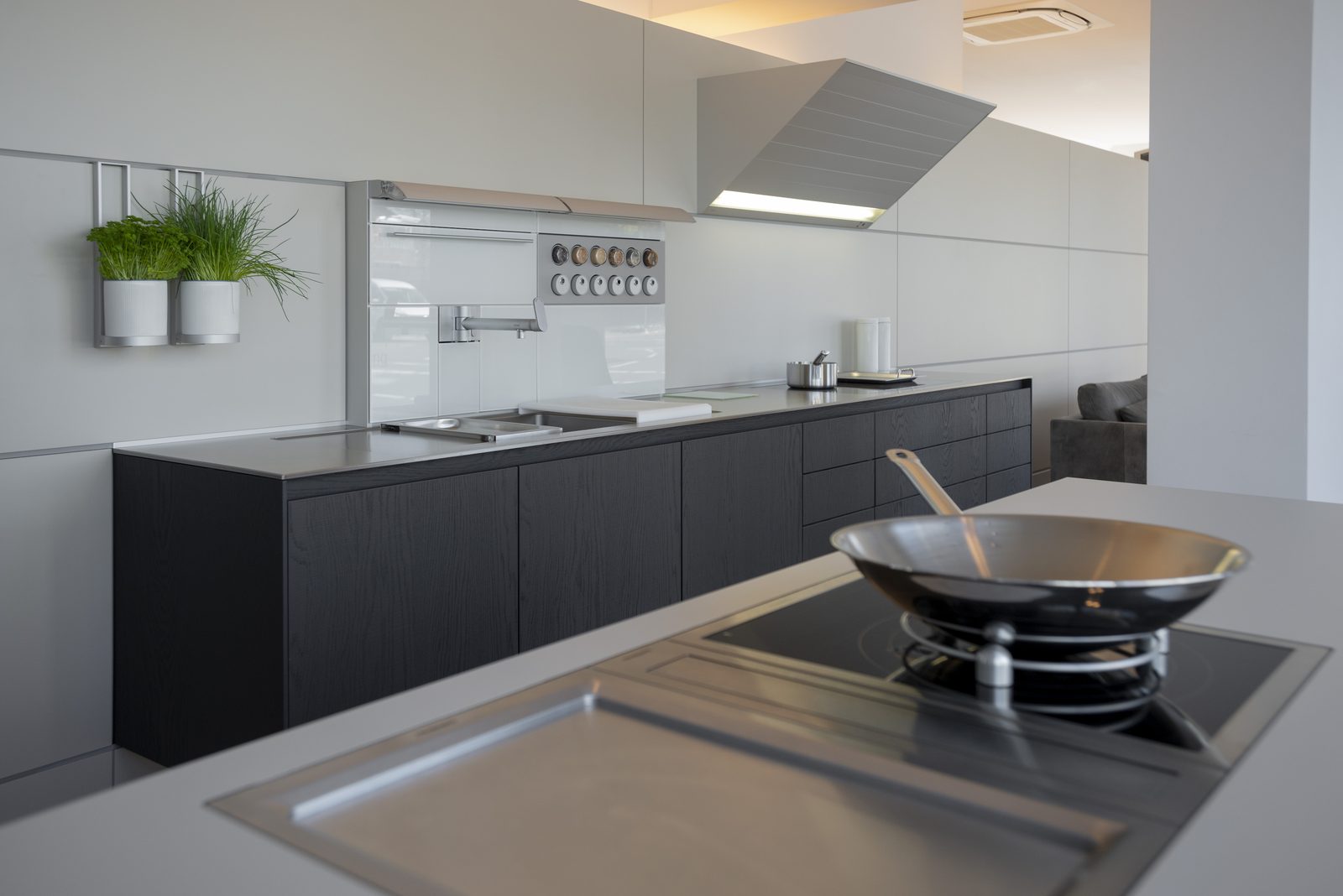 Black oak with wok on the cooktop