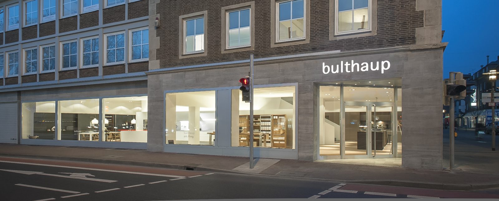 Storefront of bulthaup am Ring at blue hour